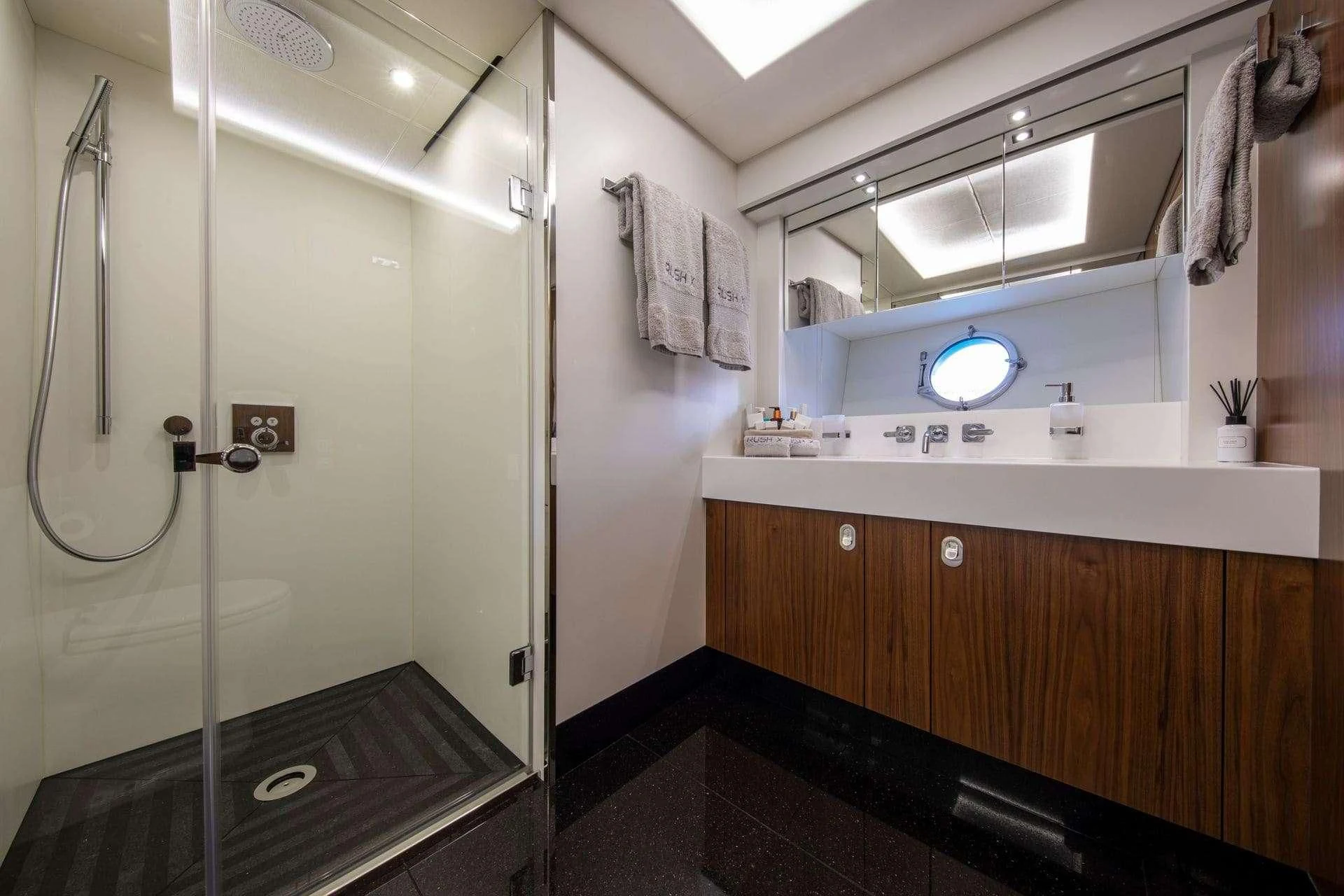 a bathroom with a shower unit aboard RUSH X Yacht for Sale