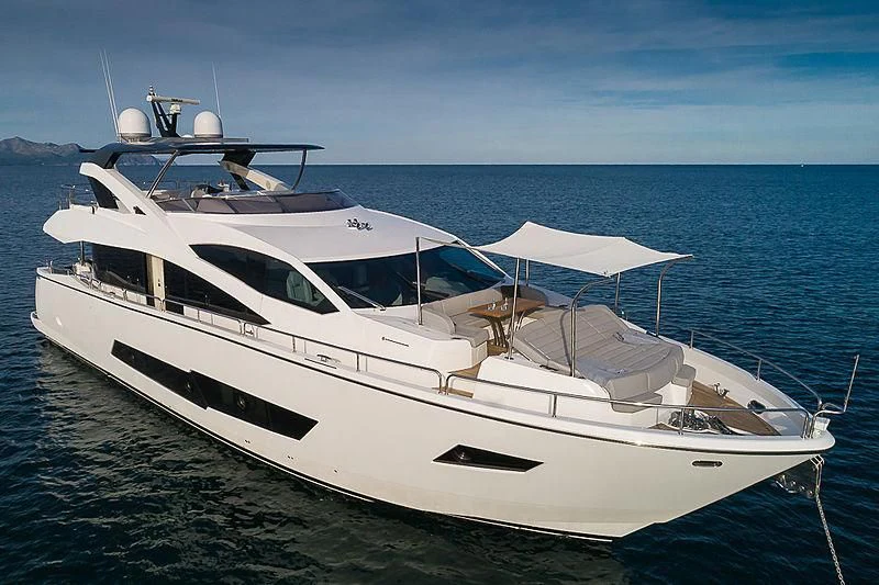 a white yacht on the water aboard RUSH X Yacht for Sale
