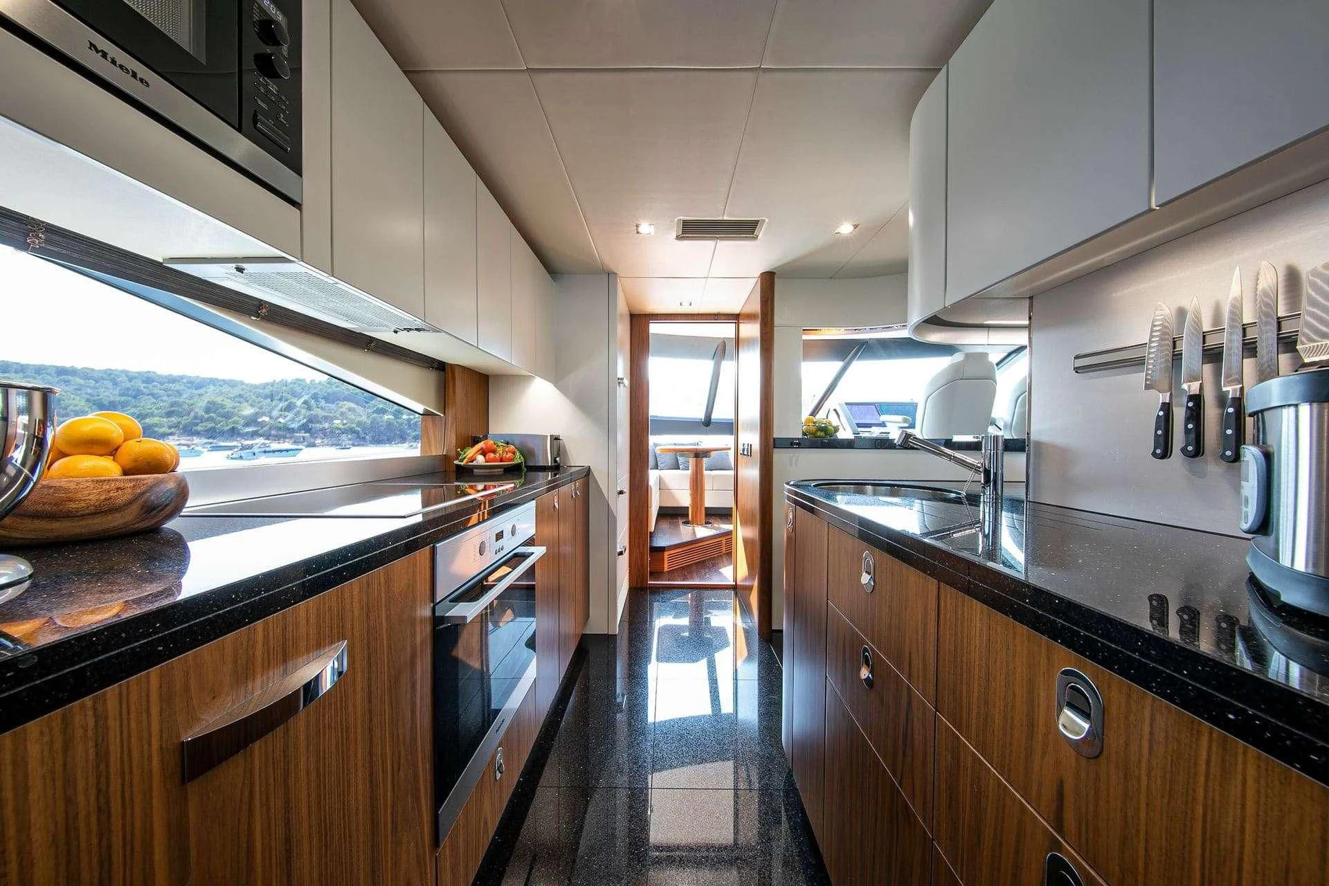 a kitchen with a stove and oven aboard RUSH X Yacht for Sale