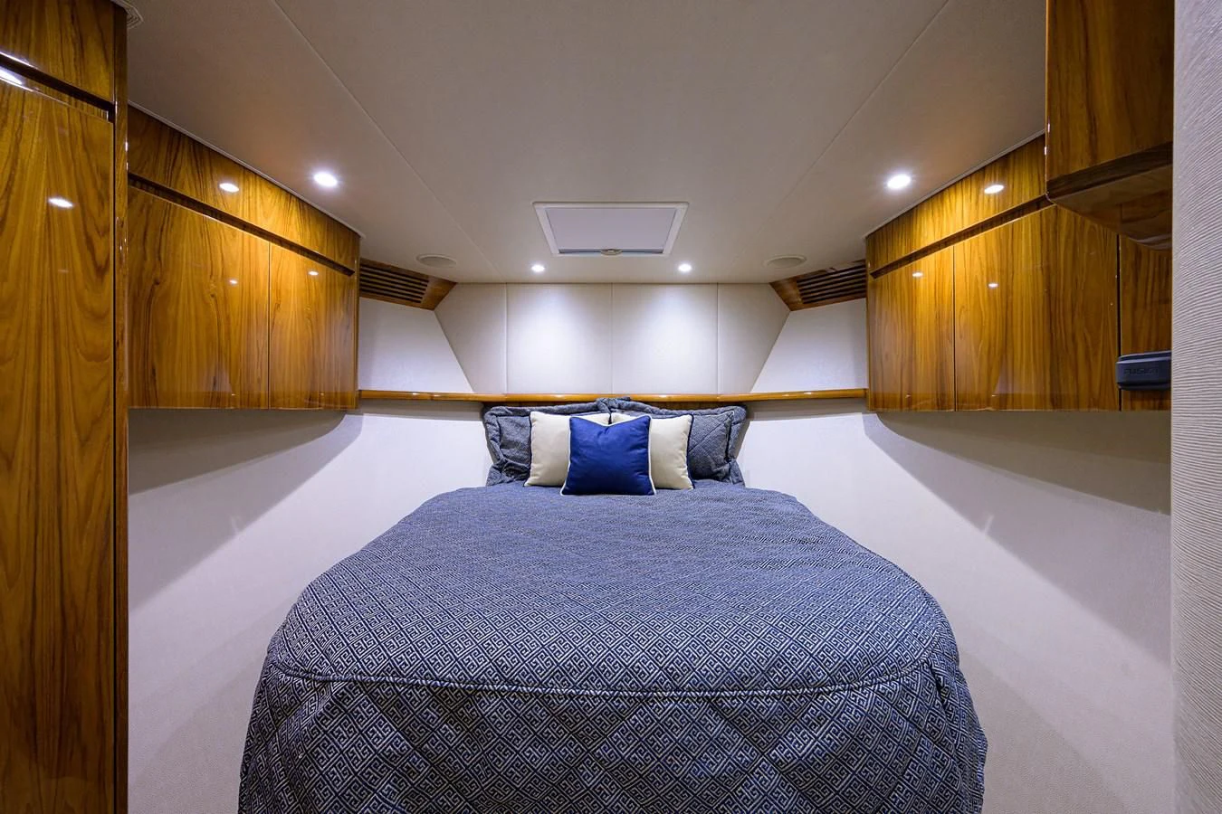 a bed in a room aboard TORO Yacht for Sale
