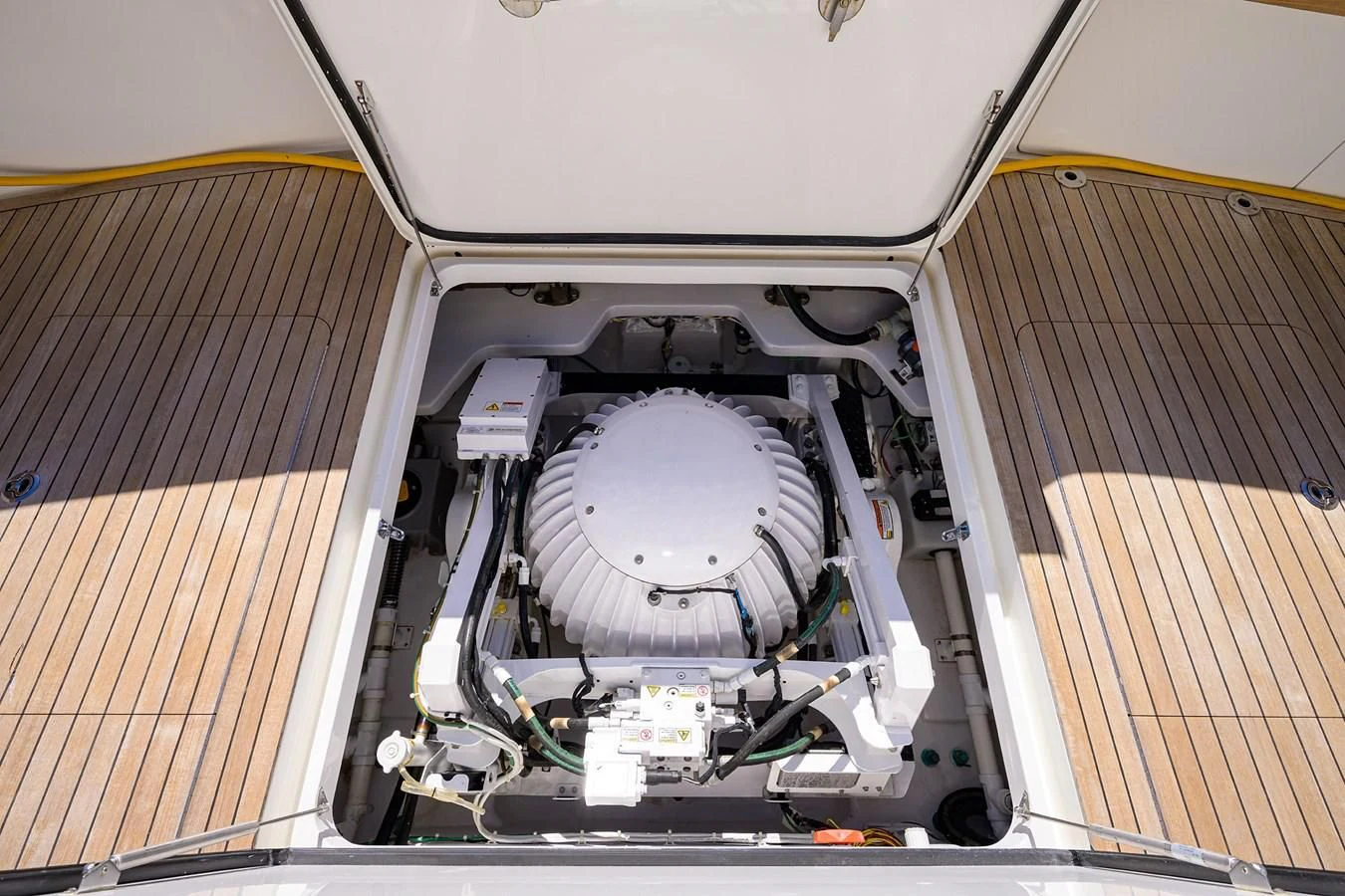 a large machine with a large metal cylinder aboard TORO Yacht for Sale