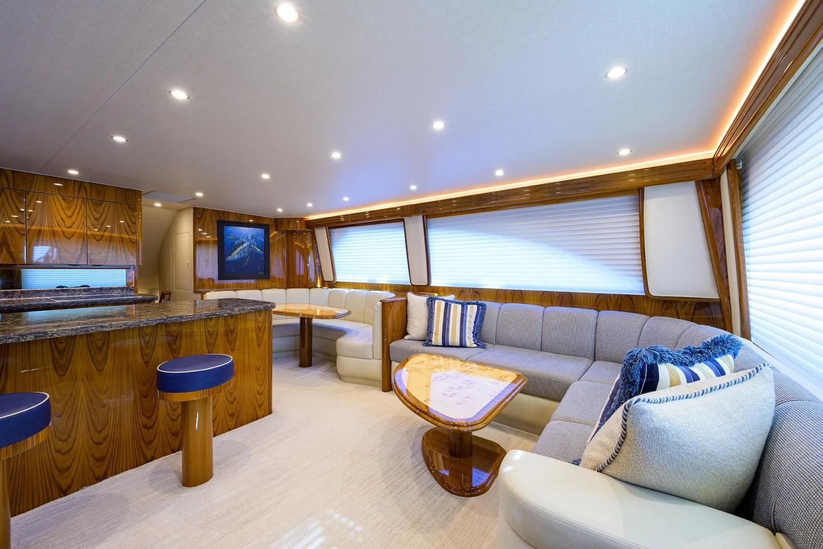 a living room with a couch and a table aboard TORO Yacht for Sale