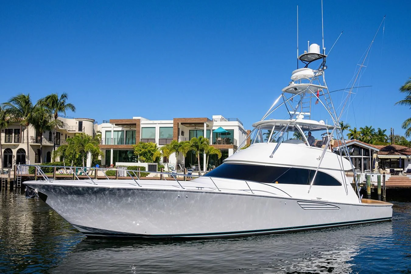 a white boat docked aboard TORO Yacht for Sale