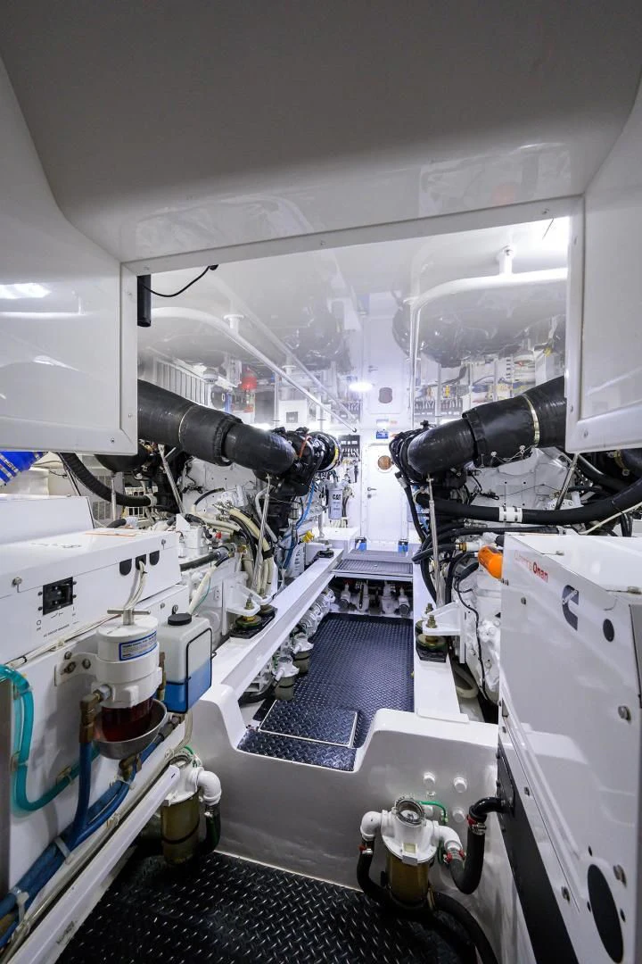 a white vehicle with a large engine aboard TORO Yacht for Sale