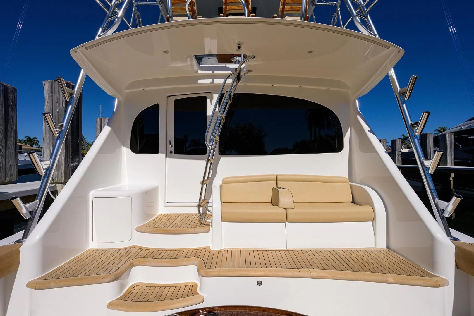 a white boat on a deck aboard TORO Yacht for Sale