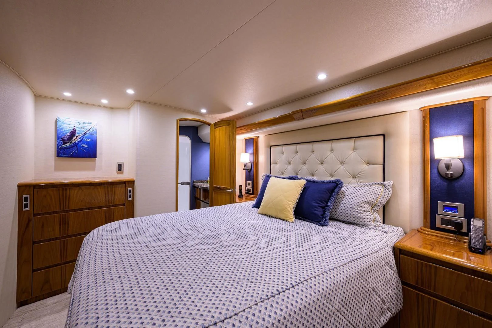 a bedroom with a large bed aboard TORO Yacht for Sale