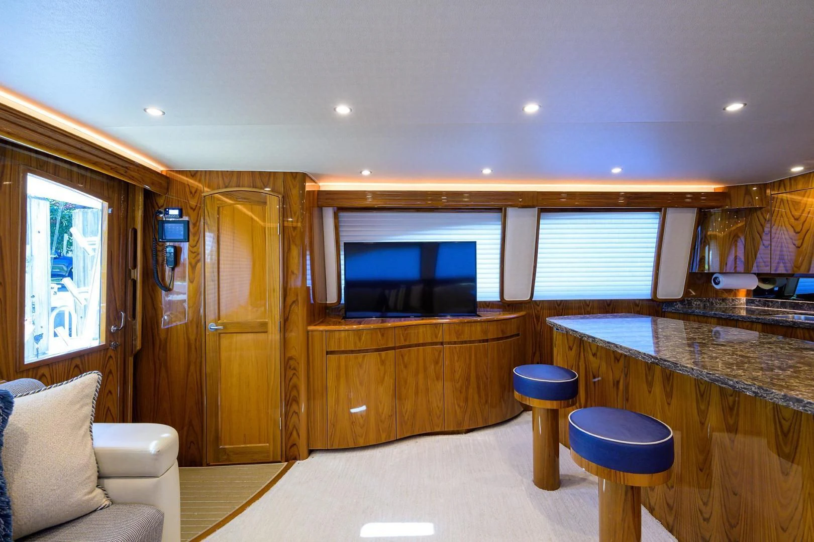 a kitchen with a bar and a bar aboard TORO Yacht for Sale
