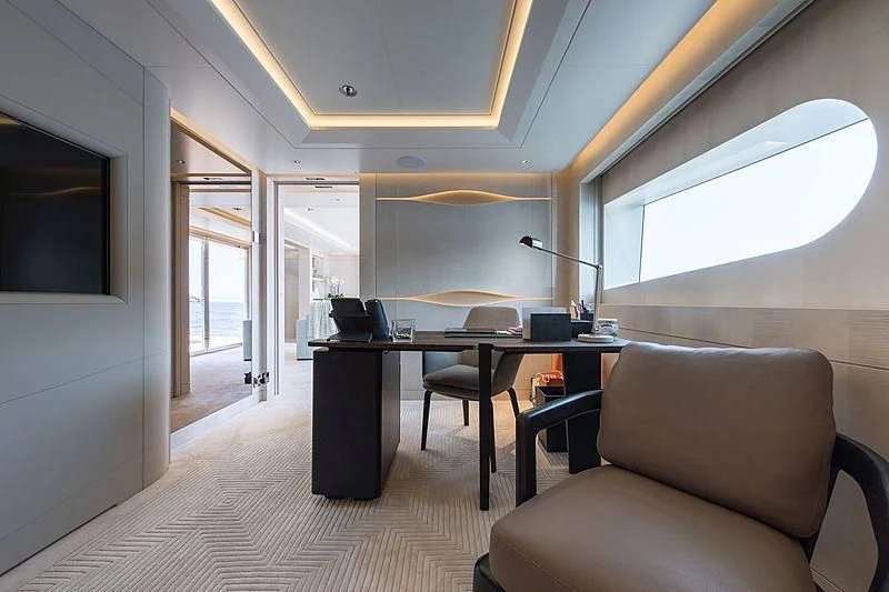 a room with a desk and a chair aboard VOLPINI 2 Yacht for Sale