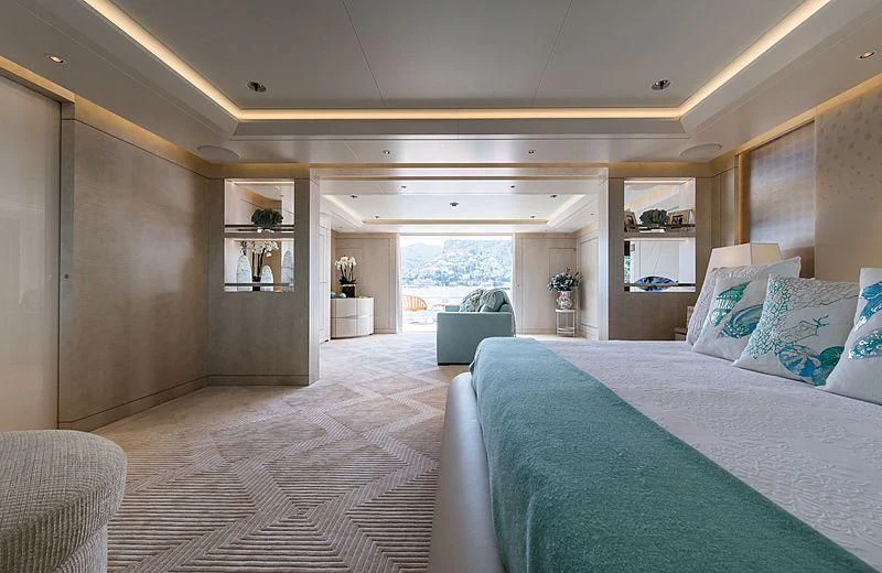 a bedroom with a large bed aboard VOLPINI 2 Yacht for Sale