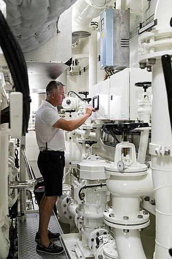 a person in a lab coat aboard VOLPINI 2 Yacht for Sale