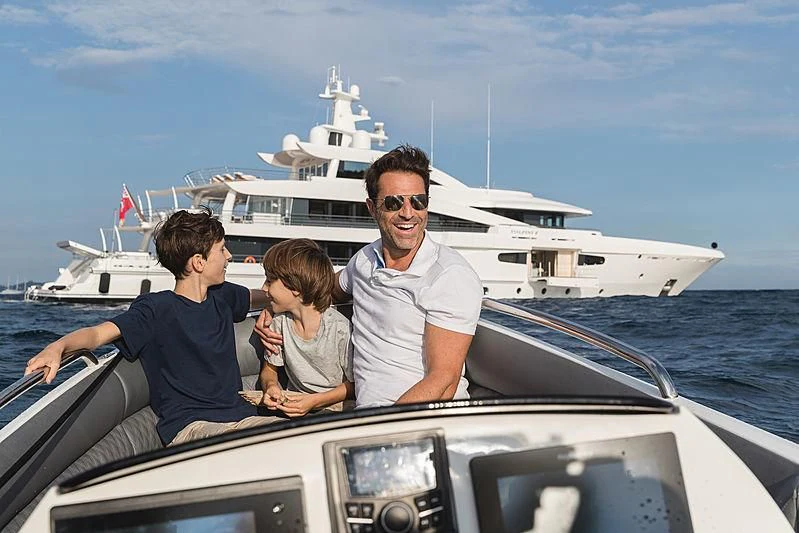 a group of people on a boat aboard VOLPINI 2 Yacht for Sale