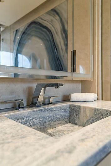 a bathroom with a large mirror aboard VOLPINI 2 Yacht for Sale