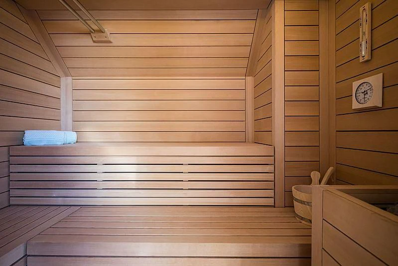 a wooden cabin with a wood railing aboard VOLPINI 2 Yacht for Sale