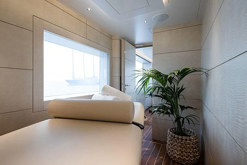 a living room with a plant aboard VOLPINI 2 Yacht for Sale