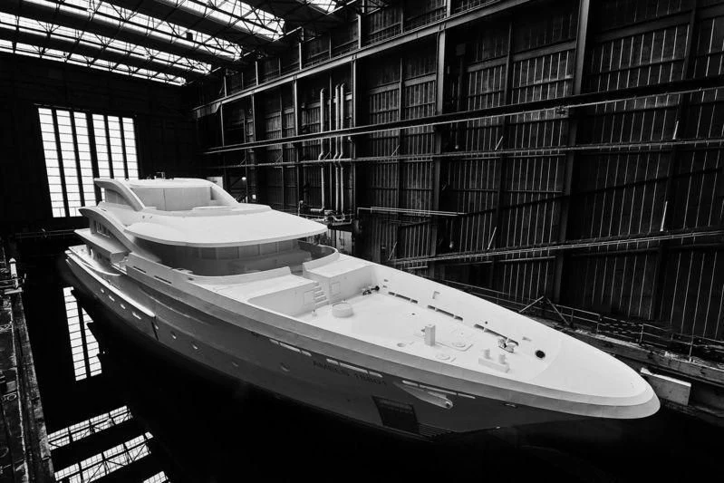 a large room with a tub and a large window aboard VOLPINI 2 Yacht for Sale