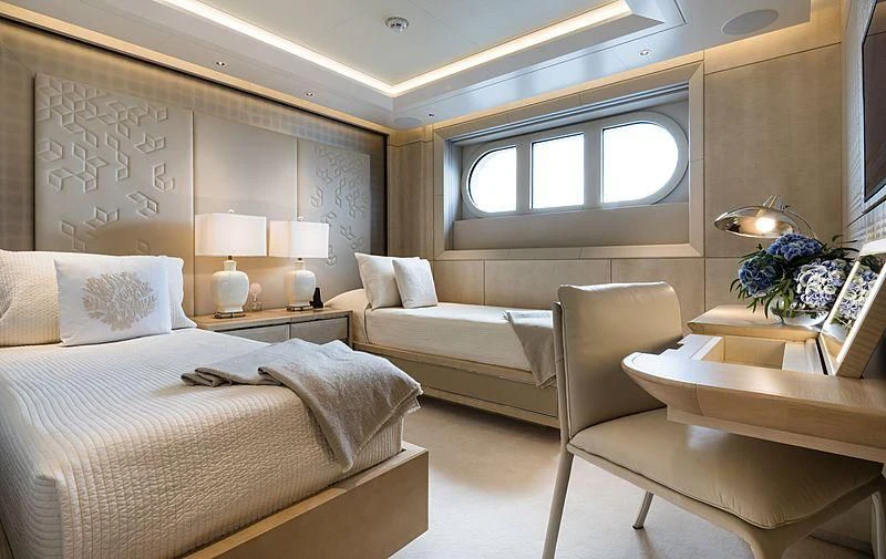 a room with a bed and a couch aboard VOLPINI 2 Yacht for Sale