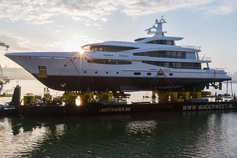 a large cruise ship docked aboard VOLPINI 2 Yacht for Sale