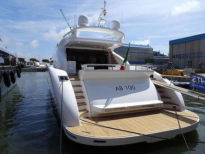 a boat docked at a pier aboard LEA III Yacht for Sale