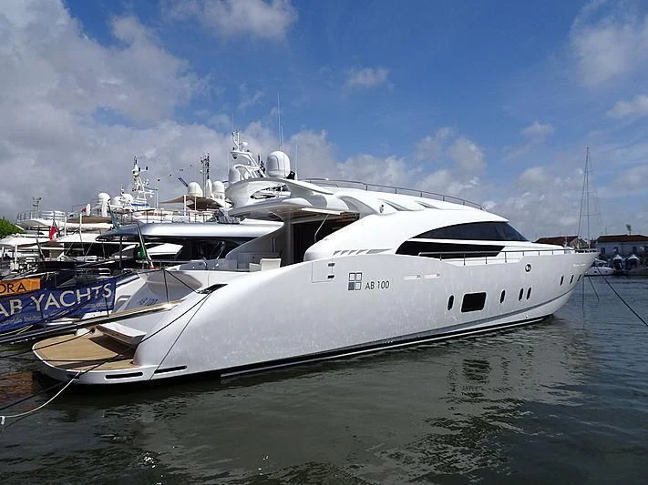 a boat docked at a pier aboard LEA III Yacht for Sale