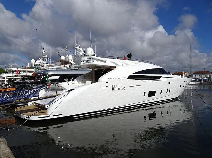 a boat docked at a pier aboard LEA III Yacht for Sale