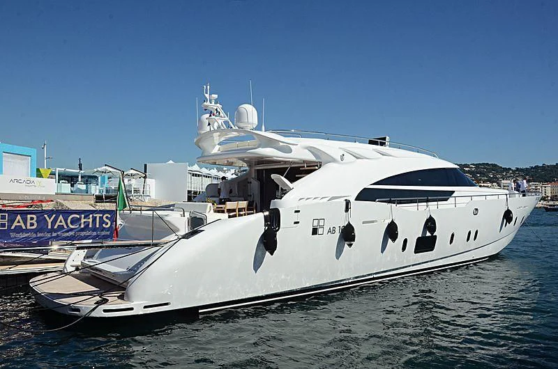 a large white boat in the water aboard LEA III Yacht for Sale