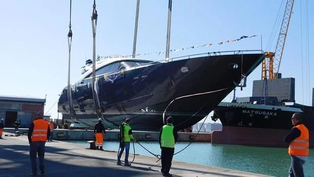 a helicopter on a deck aboard LEA III Yacht for Sale