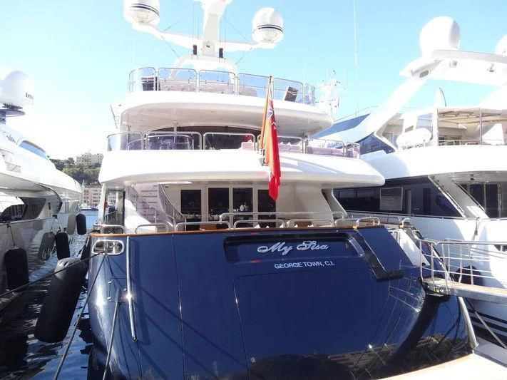 a boat docked at a pier aboard MY SISA Yacht for Sale