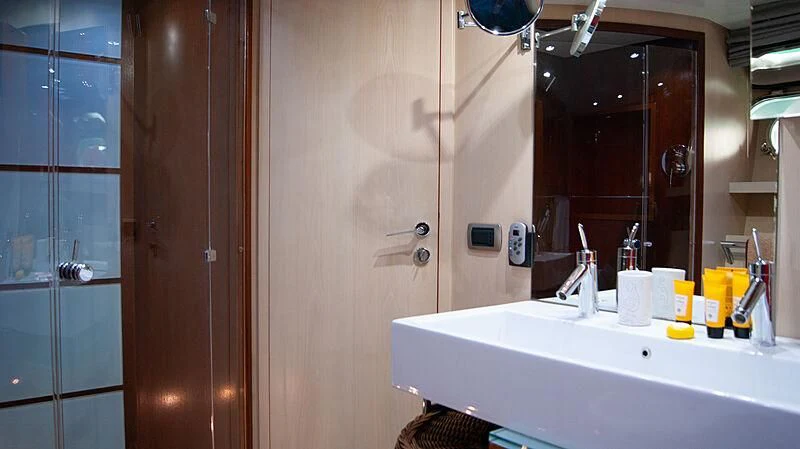 a bathroom with a sink and a shower aboard SOFIA Y Yacht for Sale