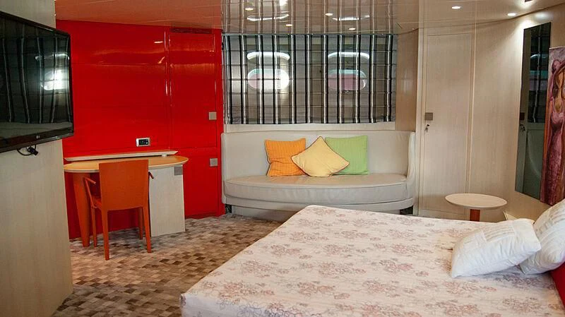 a bed in a room aboard SOFIA Y Yacht for Sale