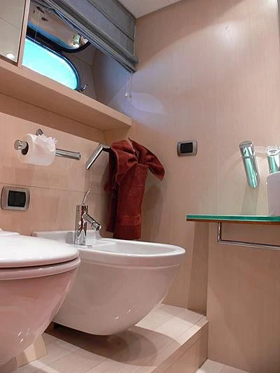 a bathroom with a toilet and a sink aboard SOFIA Y Yacht for Sale