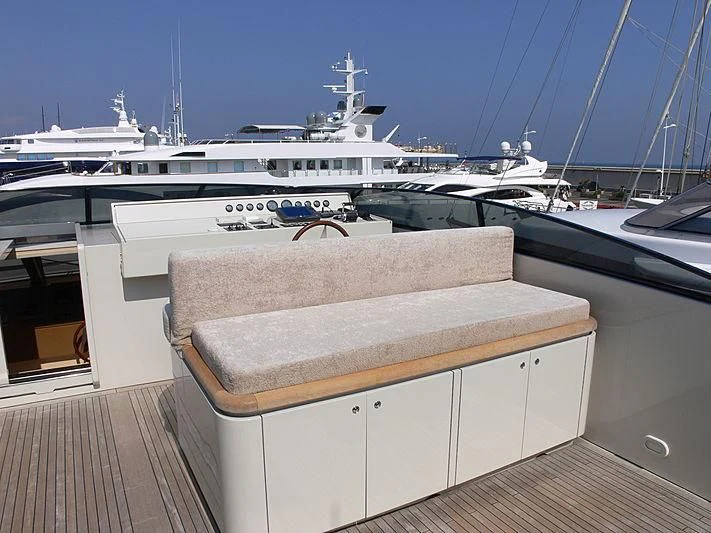 a deck with a large ship in the background aboard SOFIA Y Yacht for Sale