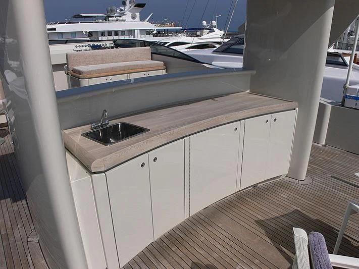 a kitchen with a sink and a window aboard SOFIA Y Yacht for Sale