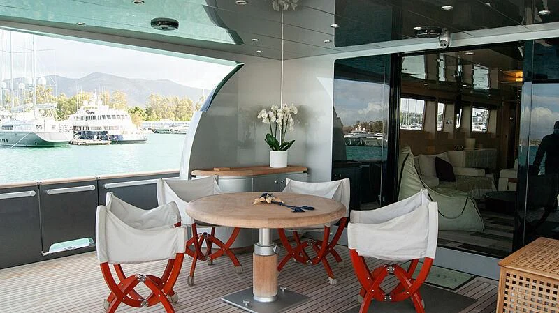 a table and chairs in a room aboard SOFIA Y Yacht for Sale