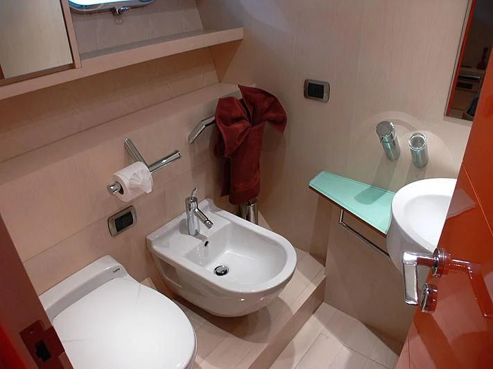 a bathroom with a sink and a toilet aboard SOFIA Y Yacht for Sale