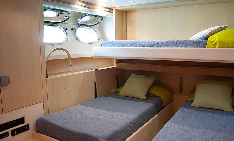 a room with two beds aboard SOFIA Y Yacht for Sale