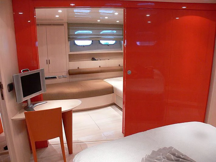 a room with a desk and a bed aboard SOFIA Y Yacht for Sale
