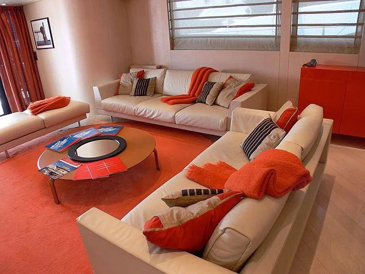 a living room with a couch and a coffee table aboard SOFIA Y Yacht for Sale