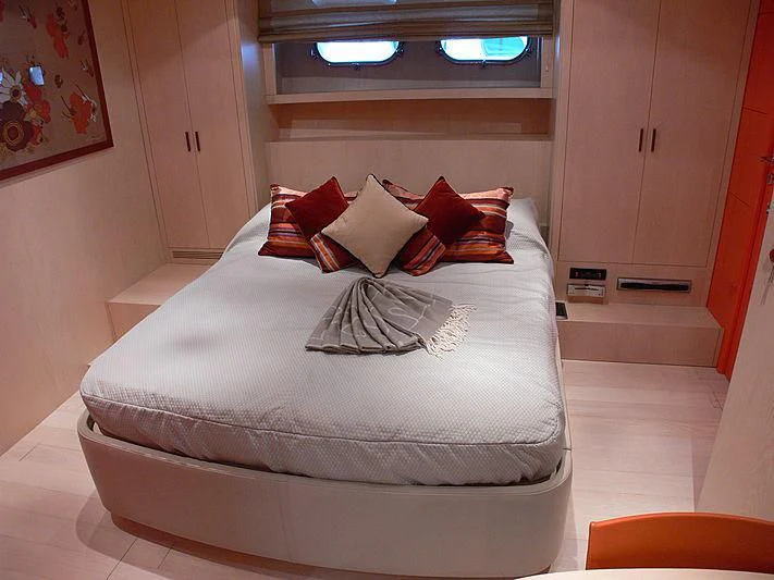 a bed with pillows aboard SOFIA Y Yacht for Sale
