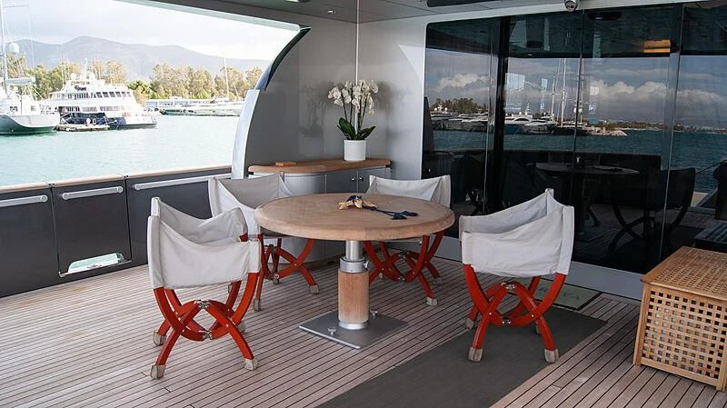 a table and chairs in a room aboard SOFIA Y Yacht for Sale