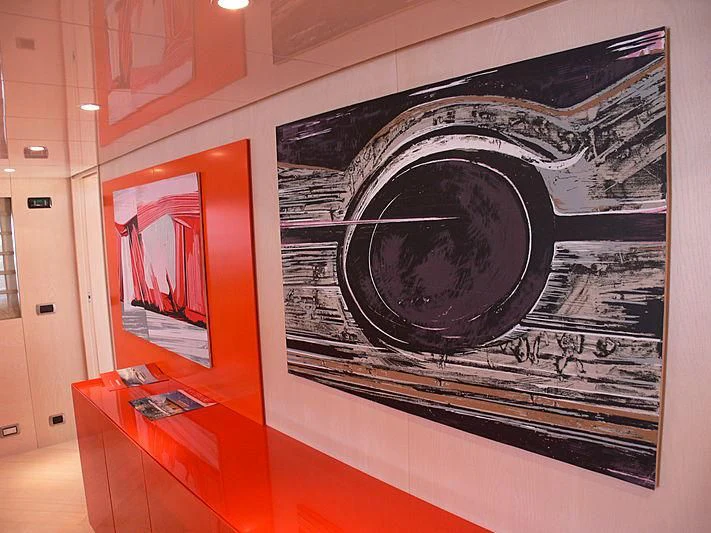 a large painting on a wall aboard SOFIA Y Yacht for Sale