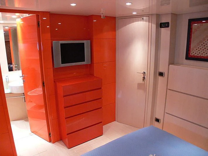 a room with a tv and a closet aboard SOFIA Y Yacht for Sale