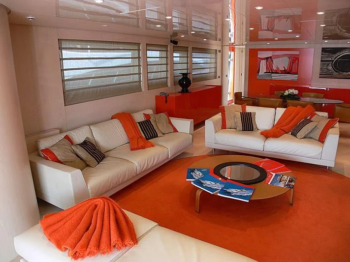 a living room with a couch and a table aboard SOFIA Y Yacht for Sale