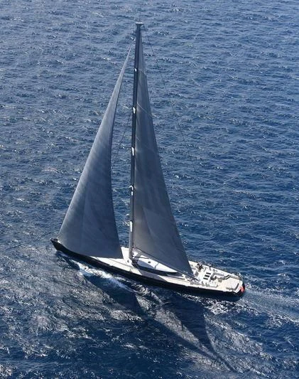 a sailboat in the water aboard BLUE PAPILLON Yacht for Sale