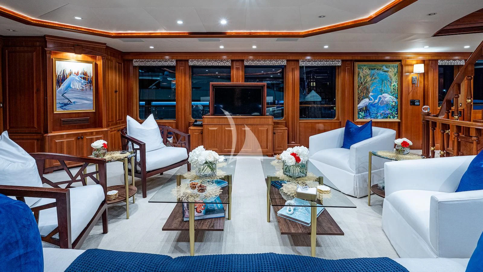 a living room with a table and chairs aboard PACKAGE DEAL Yacht for Charter