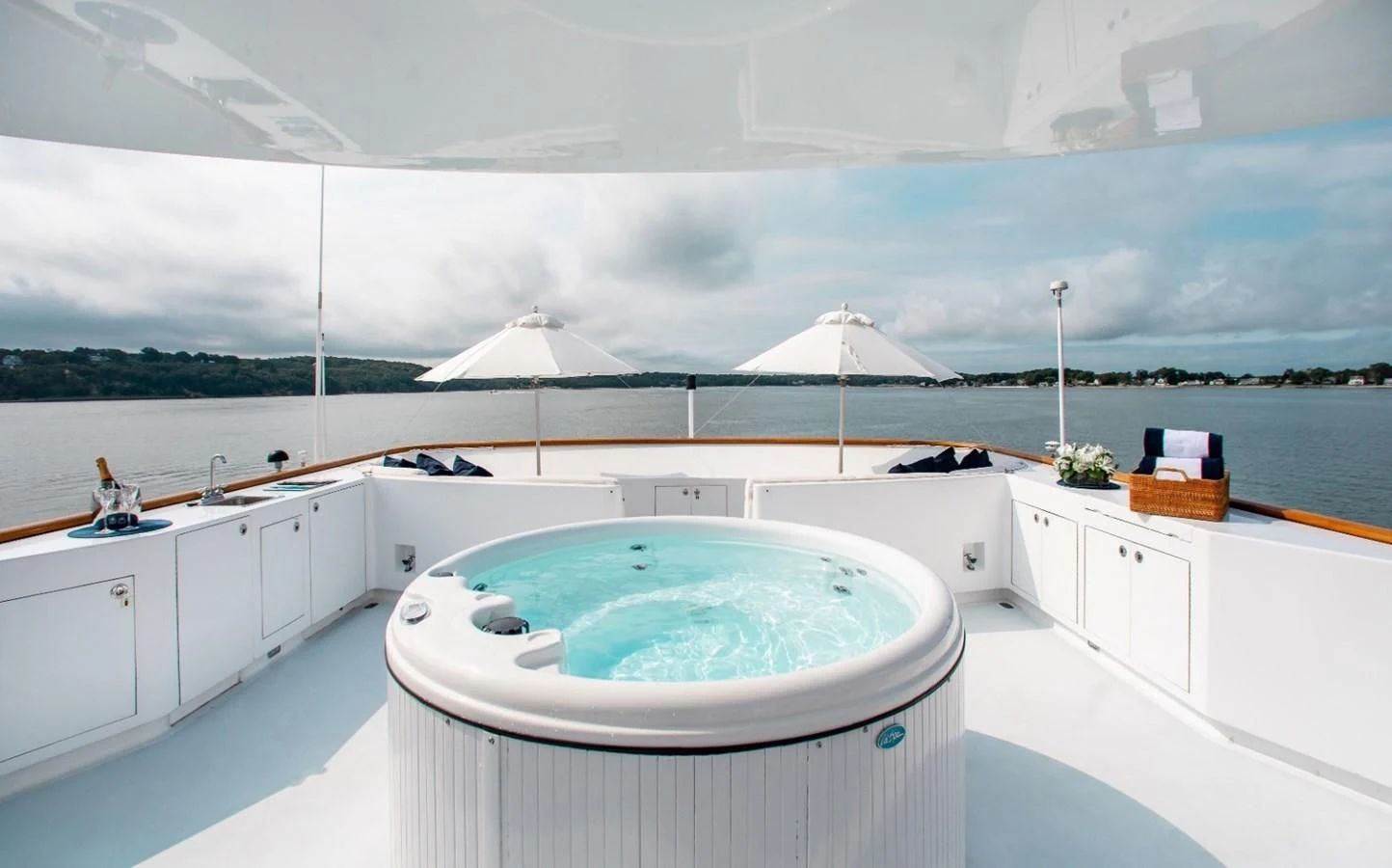 a large white tub in a large room with a large white window aboard PACKAGE DEAL Yacht for Charter