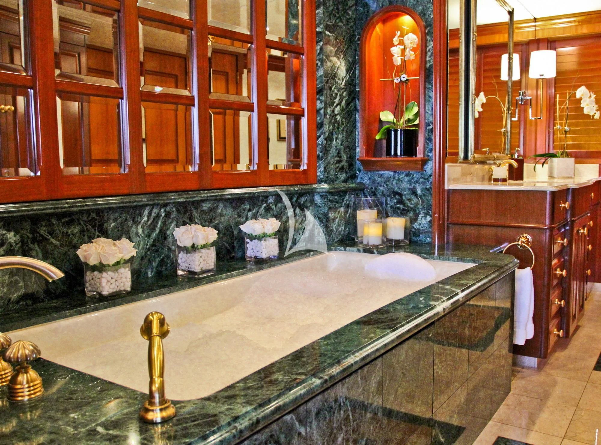 a bathroom with a marble counter aboard PACKAGE DEAL Yacht for Charter