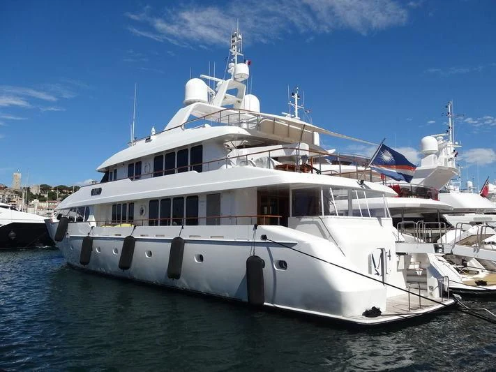 a large white boat in the water aboard PACKAGE DEAL Yacht for Charter