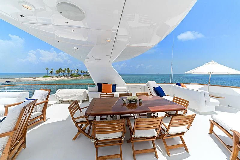 a table set for a meal on a beach aboard PACKAGE DEAL Yacht for Charter
