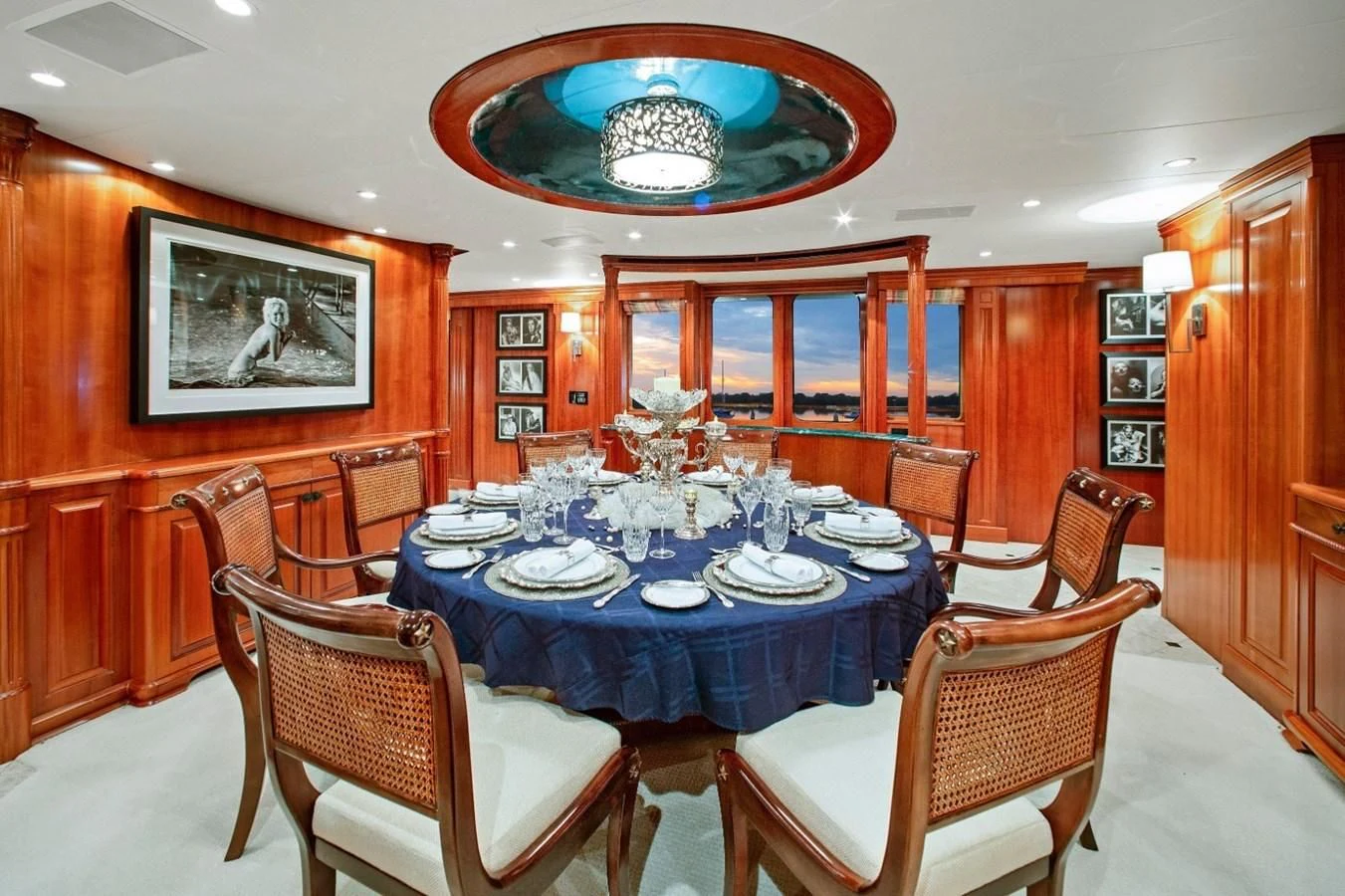a dining room with a table and chairs aboard PACKAGE DEAL Yacht for Charter