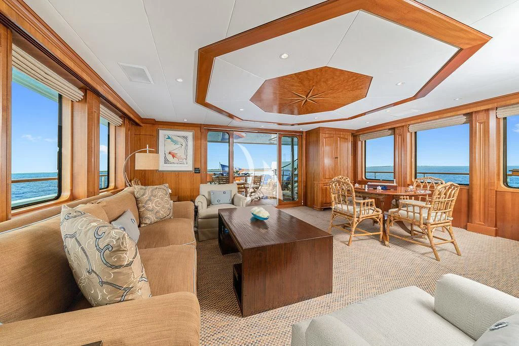 a living room with a large open window aboard PACKAGE DEAL Yacht for Charter
